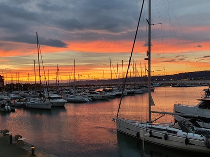 Yachthafen - Bewacht - Italien - Sonnenuntergang - Porto San Rocco Marina Resort S.r.l.